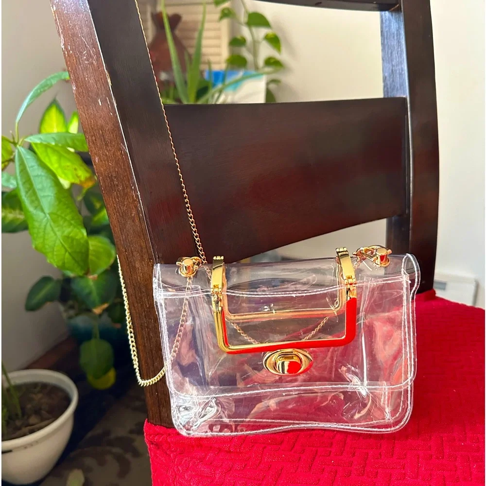 NIP Clear PVC Crossbody with gold chain. Gold hardware- wallet not included. - Picture 1 of 7
